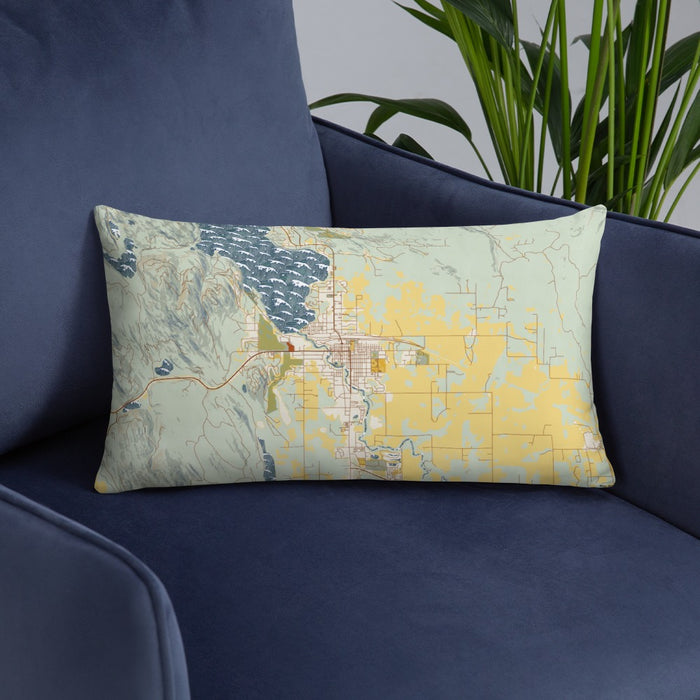 Custom Whitefish Montana Map Throw Pillow in Woodblock on Blue Colored Chair