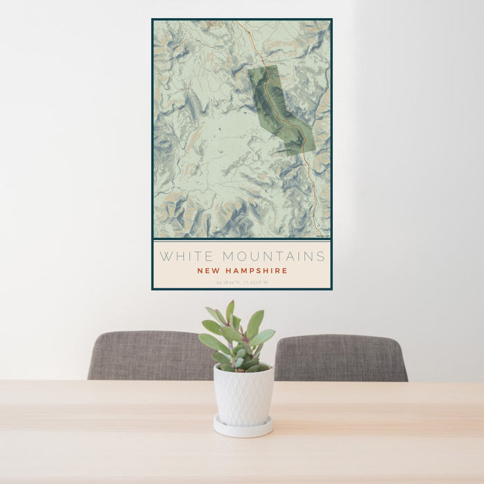 24x36 White Mountains New Hampshire Map Print Portrait Orientation in Woodblock Style Behind 2 Chairs Table and Potted Plant