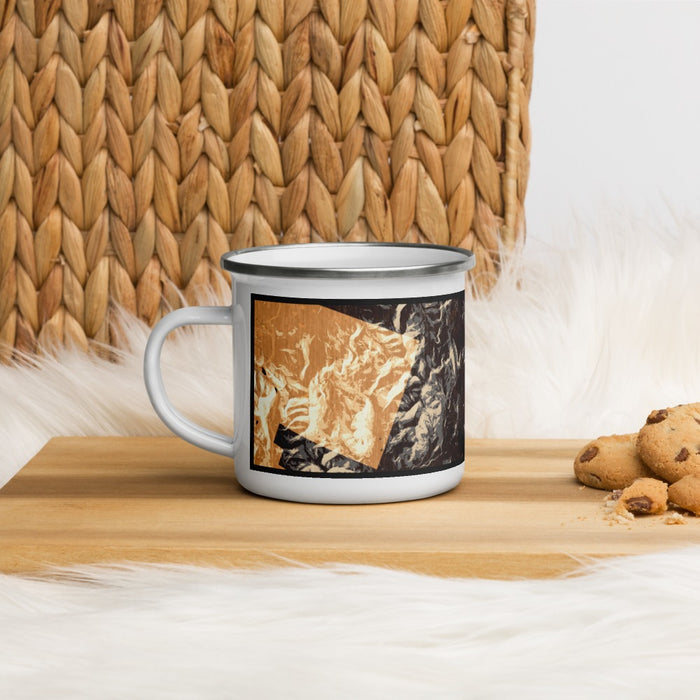 Left View Custom White Mountains New Hampshire Map Enamel Mug in Ember on Table Top