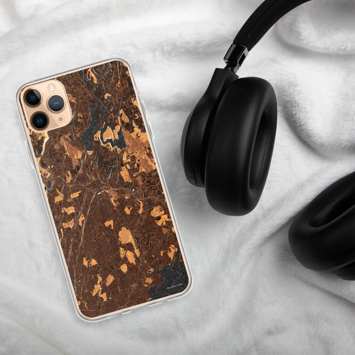 Custom White Plains New York Map Phone Case in Ember on Table with Black Headphones