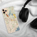 Custom White Plains New York Map Phone Case in Woodblock on Table with Black Headphones