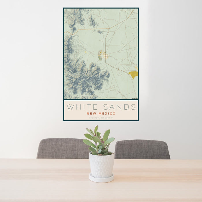 24x36 White Sands New Mexico Map Print Portrait Orientation in Woodblock Style Behind 2 Chairs Table and Potted Plant
