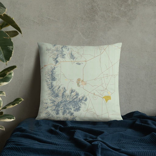 Custom White Sands New Mexico Map Throw Pillow in Woodblock on Bedding Against Wall