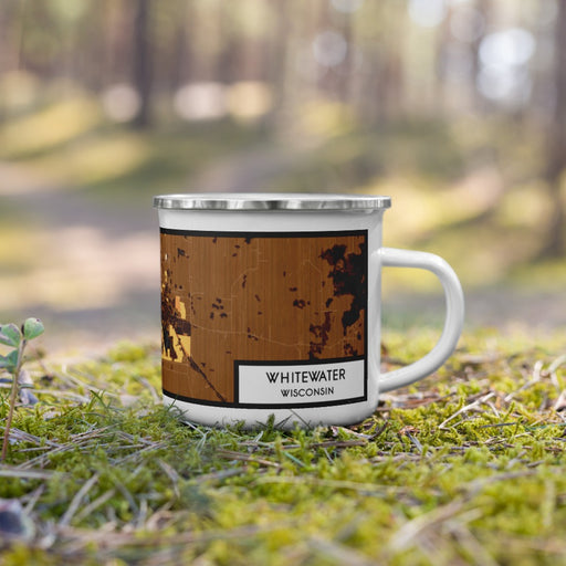 Right View Custom Whitewater Wisconsin Map Enamel Mug in Ember on Grass With Trees in Background