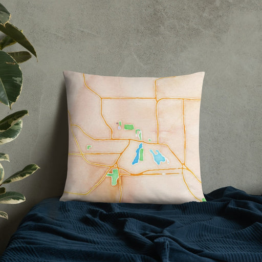 Custom Whitewater Wisconsin Map Throw Pillow in Watercolor on Bedding Against Wall