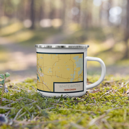 Right View Custom Whitewater Wisconsin Map Enamel Mug in Woodblock on Grass With Trees in Background