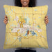 Person holding 22x22 Custom Whitewater Wisconsin Map Throw Pillow in Woodblock