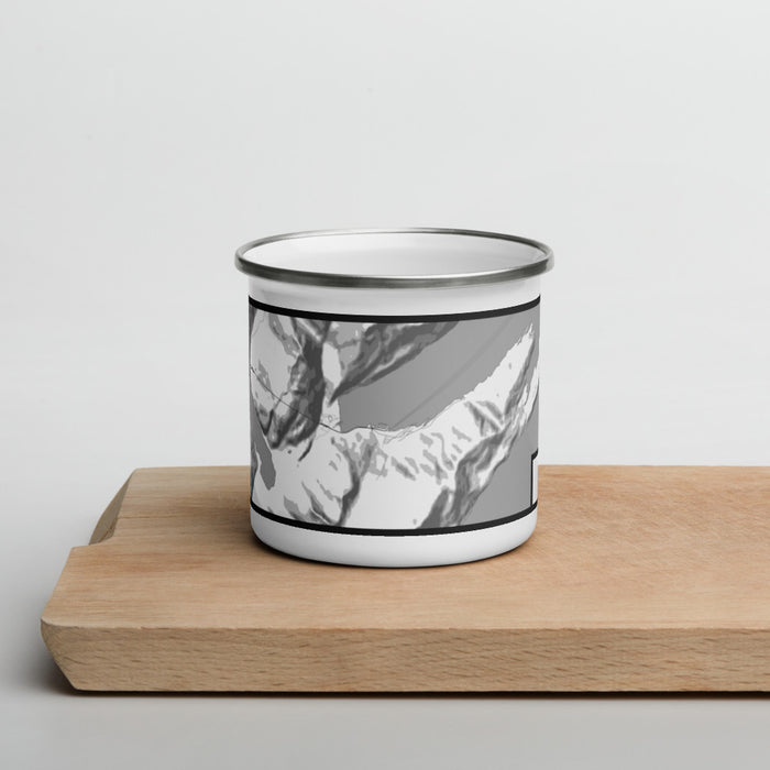 Front View Custom Whittier Alaska Map Enamel Mug in Classic on Cutting Board