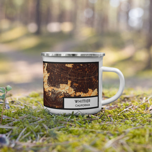Right View Custom Whittier California Map Enamel Mug in Ember on Grass With Trees in Background