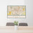 24x36 Wichita Kansas Map Print Landscape Orientation in Woodblock Style Behind 2 Chairs Table and Potted Plant
