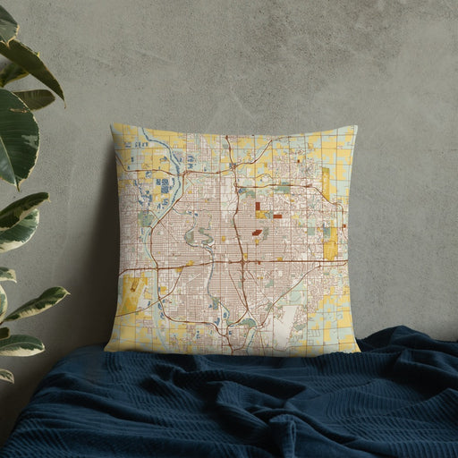 Custom Wichita Kansas Map Throw Pillow in Woodblock on Bedding Against Wall