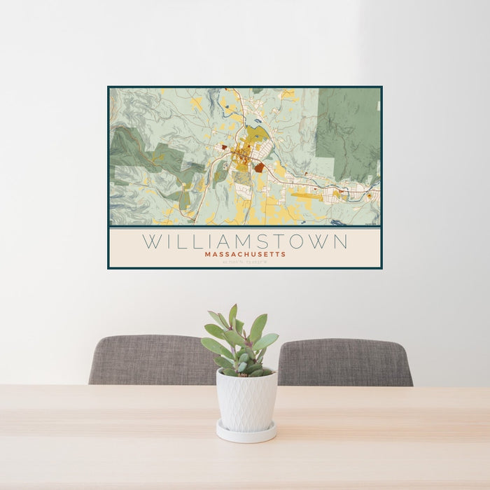 24x36 Williamstown Massachusetts Map Print Landscape Orientation in Woodblock Style Behind 2 Chairs Table and Potted Plant
