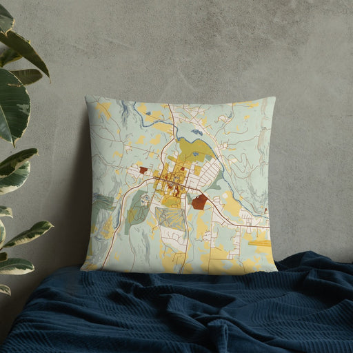 Custom Williamstown Massachusetts Map Throw Pillow in Woodblock on Bedding Against Wall