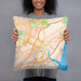 Person holding 18x18 Custom Wilmington Delaware Map Throw Pillow in Watercolor