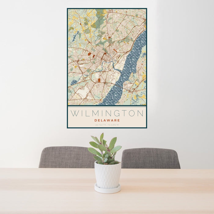 24x36 Wilmington Delaware Map Print Portrait Orientation in Woodblock Style Behind 2 Chairs Table and Potted Plant