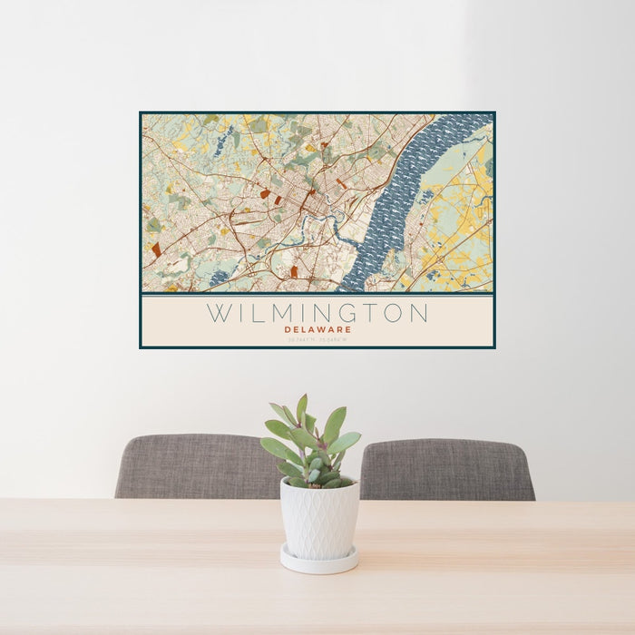24x36 Wilmington Delaware Map Print Landscape Orientation in Woodblock Style Behind 2 Chairs Table and Potted Plant