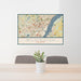24x36 Wilmington Delaware Map Print Landscape Orientation in Woodblock Style Behind 2 Chairs Table and Potted Plant