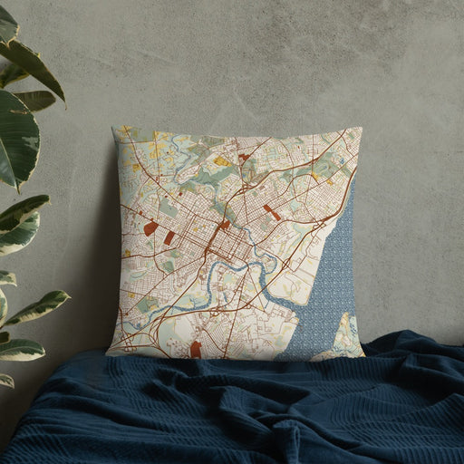 Custom Wilmington Delaware Map Throw Pillow in Woodblock on Bedding Against Wall