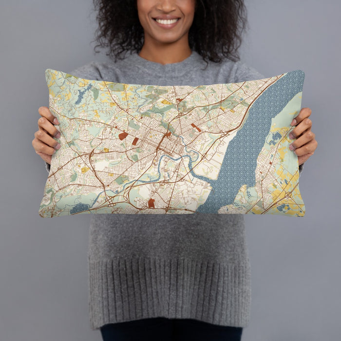 Person holding 20x12 Custom Wilmington Delaware Map Throw Pillow in Woodblock