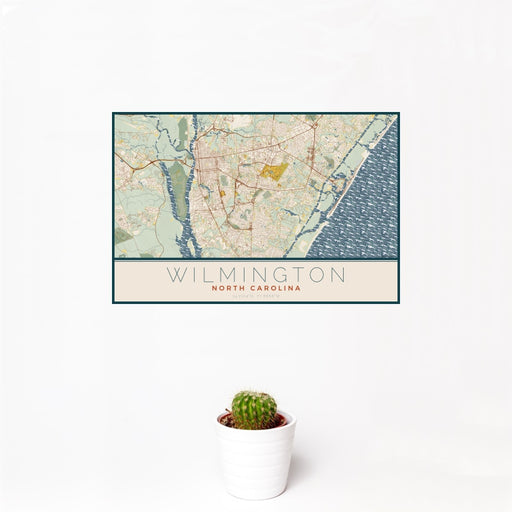12x18 Wilmington North Carolina Map Print Landscape Orientation in Woodblock Style With Small Cactus Plant in White Planter