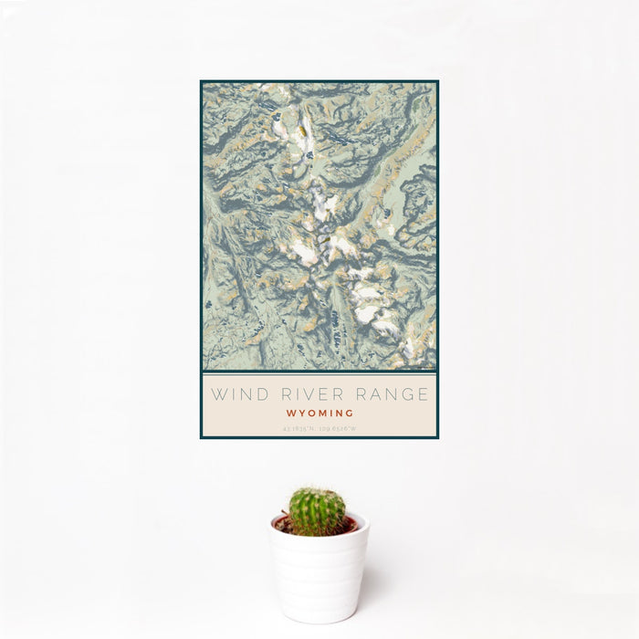 12x18 Wind River Range Wyoming Map Print Portrait Orientation in Woodblock Style With Small Cactus Plant in White Planter