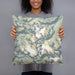 Person holding 18x18 Custom Wind River Range Wyoming Map Throw Pillow in Woodblock