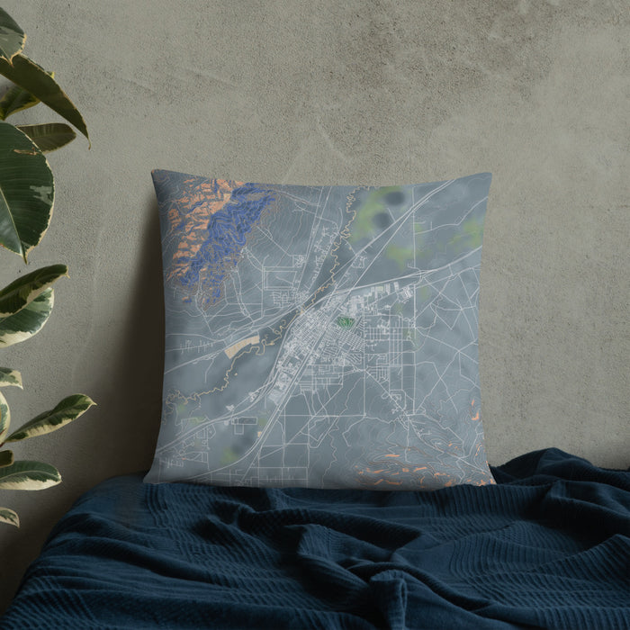 Custom Winnemucca Nevada Map Throw Pillow in Afternoon on Bedding Against Wall