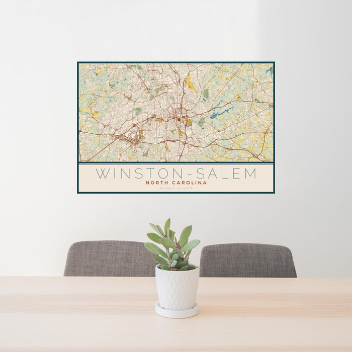 24x36 Winston-Salem North Carolina Map Print Landscape Orientation in Woodblock Style Behind 2 Chairs Table and Potted Plant