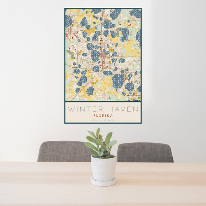 24x36 Winter Haven Florida Map Print Portrait Orientation in Woodblock Style Behind 2 Chairs Table and Potted Plant
