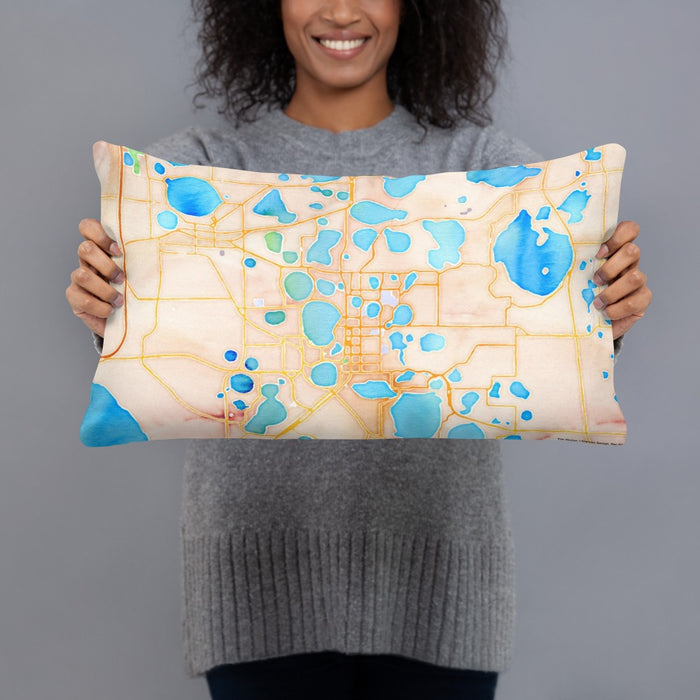 Person holding 20x12 Custom Winter Haven Florida Map Throw Pillow in Watercolor