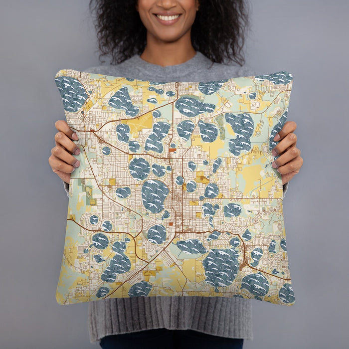 Person holding 18x18 Custom Winter Haven Florida Map Throw Pillow in Woodblock