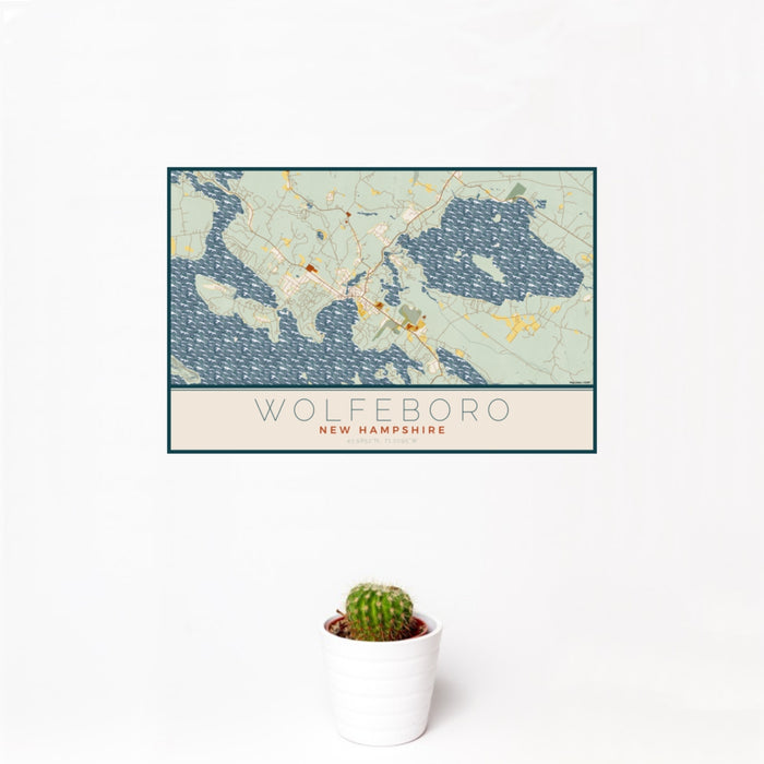 12x18 Wolfeboro New Hampshire Map Print Landscape Orientation in Woodblock Style With Small Cactus Plant in White Planter