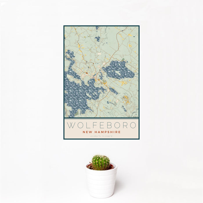 12x18 Wolfeboro New Hampshire Map Print Portrait Orientation in Woodblock Style With Small Cactus Plant in White Planter