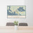 24x36 Wolfeboro New Hampshire Map Print Lanscape Orientation in Woodblock Style Behind 2 Chairs Table and Potted Plant