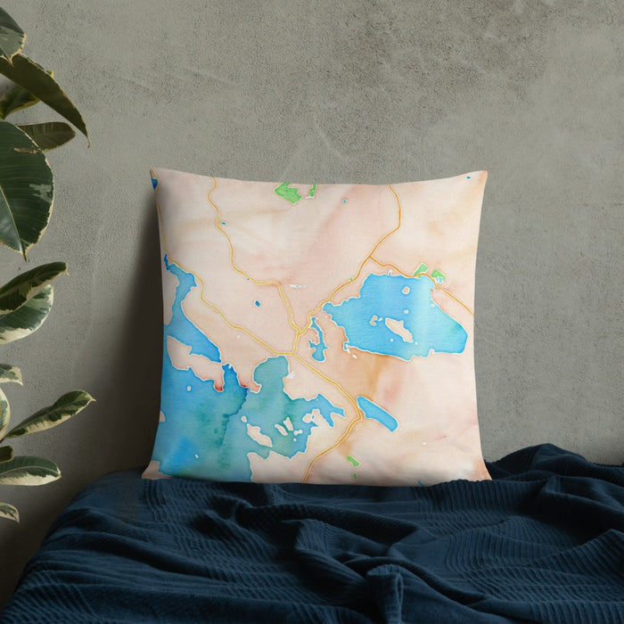 Custom Wolfeboro New Hampshire Map Throw Pillow in Watercolor on Bedding Against Wall