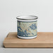 Front View Custom Wolfeboro New Hampshire Map Enamel Mug in Woodblock on Cutting Board