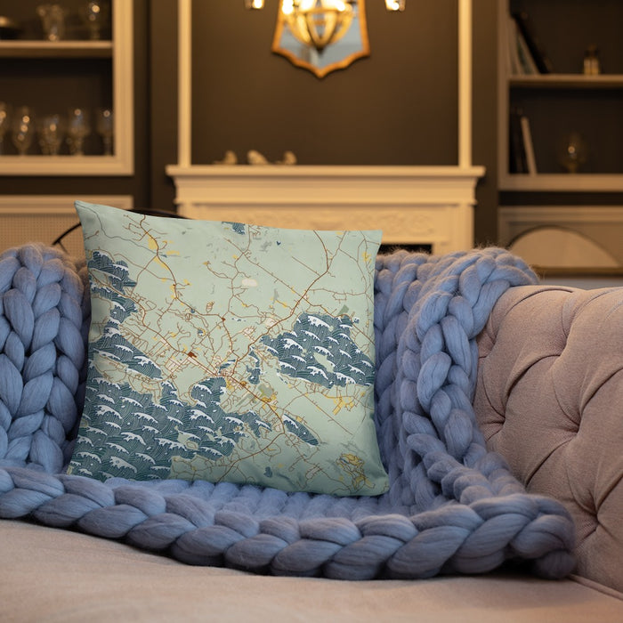 Custom Wolfeboro New Hampshire Map Throw Pillow in Woodblock on Cream Colored Couch
