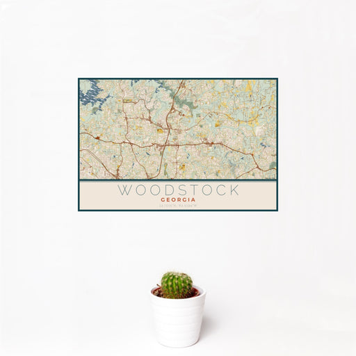12x18 Woodstock Georgia Map Print Landscape Orientation in Woodblock Style With Small Cactus Plant in White Planter