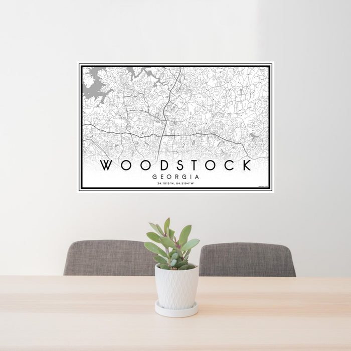 24x36 Woodstock Georgia Map Print Lanscape Orientation in Classic Style Behind 2 Chairs Table and Potted Plant