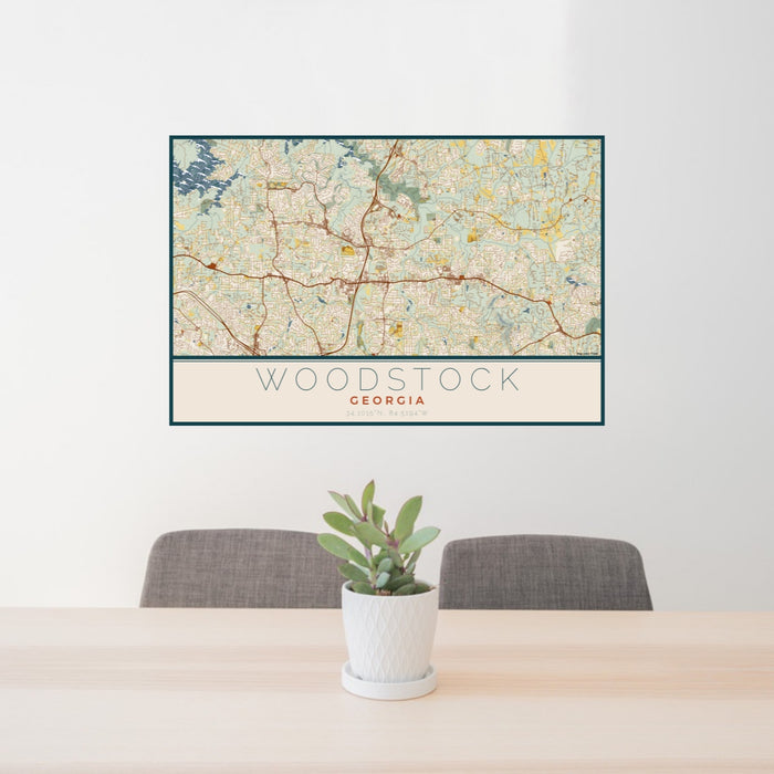 24x36 Woodstock Georgia Map Print Lanscape Orientation in Woodblock Style Behind 2 Chairs Table and Potted Plant