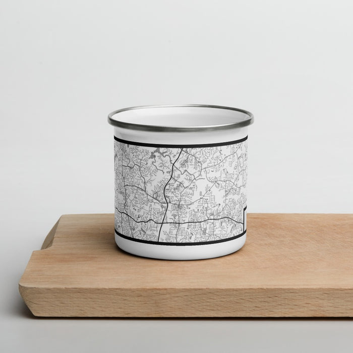 Front View Custom Woodstock Georgia Map Enamel Mug in Classic on Cutting Board