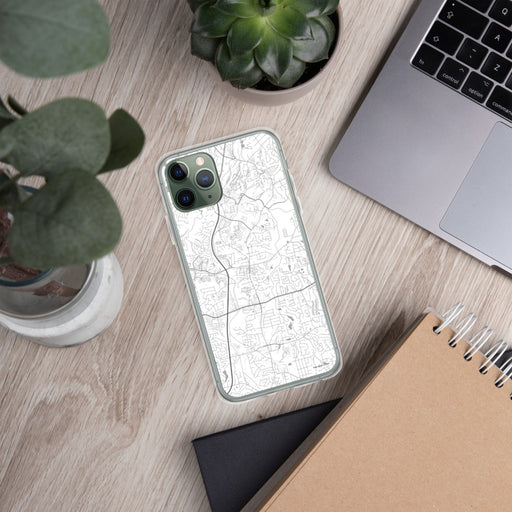 Custom Woodstock Georgia Map Phone Case in Classic on Table with Laptop and Plant