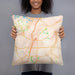 Person holding 18x18 Custom Woodstock Georgia Map Throw Pillow in Watercolor