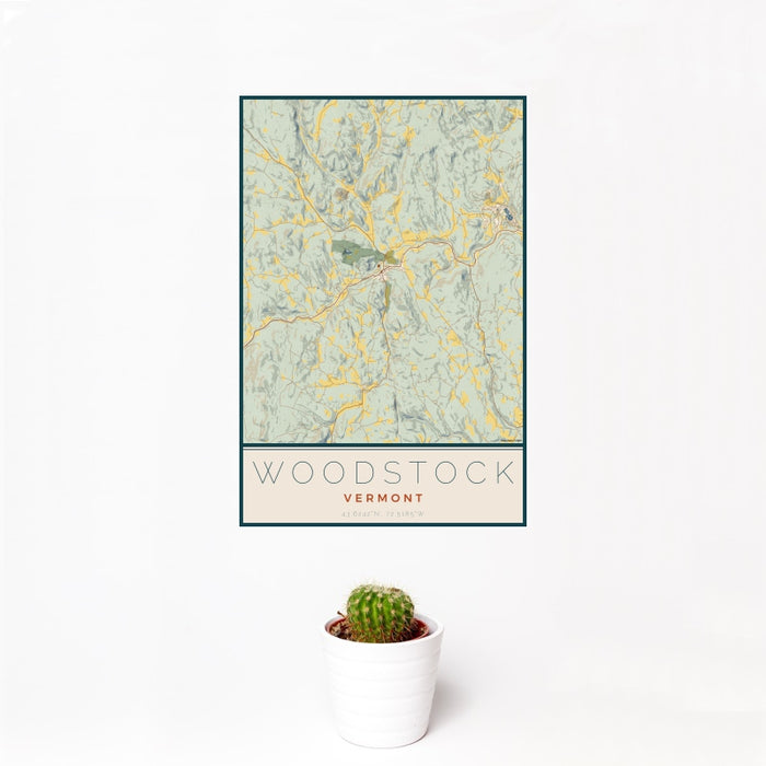 12x18 Woodstock Vermont Map Print Portrait Orientation in Woodblock Style With Small Cactus Plant in White Planter