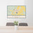 24x36 Worland Wyoming Map Print Lanscape Orientation in Woodblock Style Behind 2 Chairs Table and Potted Plant