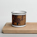 Front View Custom Worland Wyoming Map Enamel Mug in Ember on Cutting Board