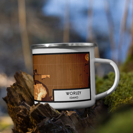 Right View Custom Worley Idaho Map Enamel Mug in Ember on Grass With Trees in Background