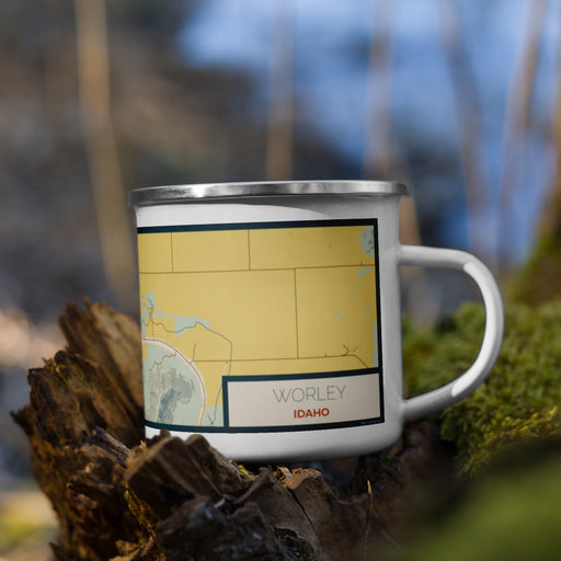 Right View Custom Worley Idaho Map Enamel Mug in Woodblock on Grass With Trees in Background