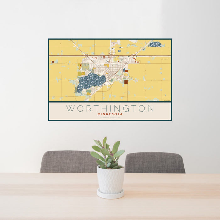 24x36 Worthington Minnesota Map Print Landscape Orientation in Woodblock Style Behind 2 Chairs Table and Potted Plant