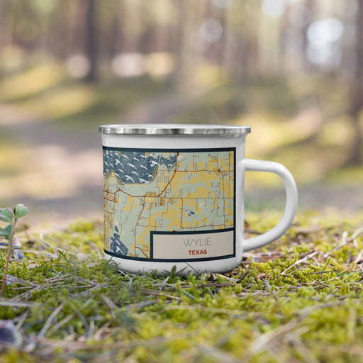 Right View Custom Wylie Texas Map Enamel Mug in Woodblock on Grass With Trees in Background